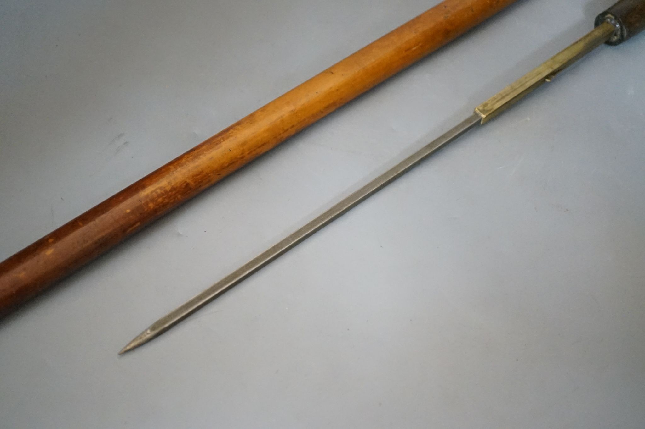 A horn-handled sword-stick, the end of the handle with unscrew-able section, circa 1900